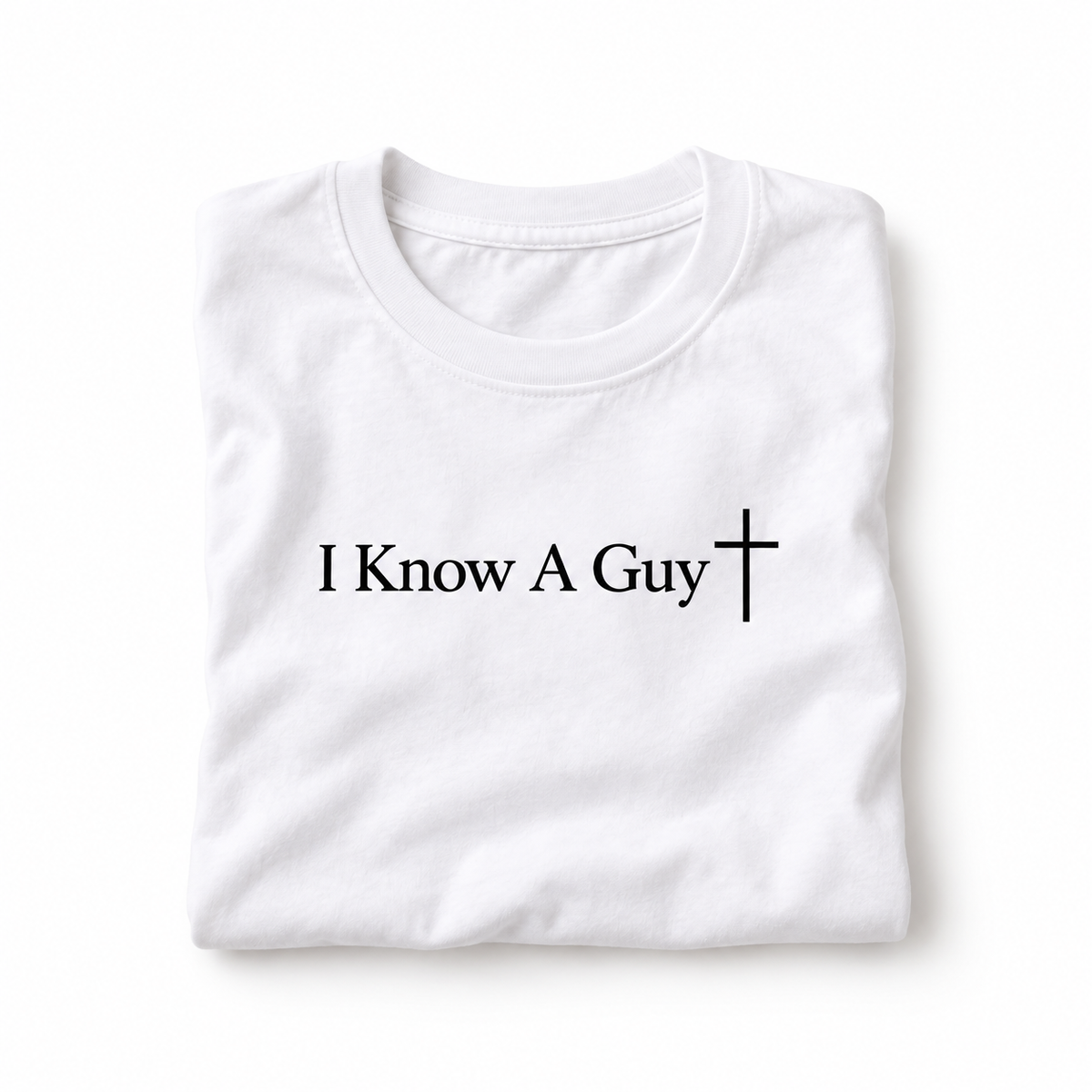 White I Know A Guy tee folded with black lettering and cross