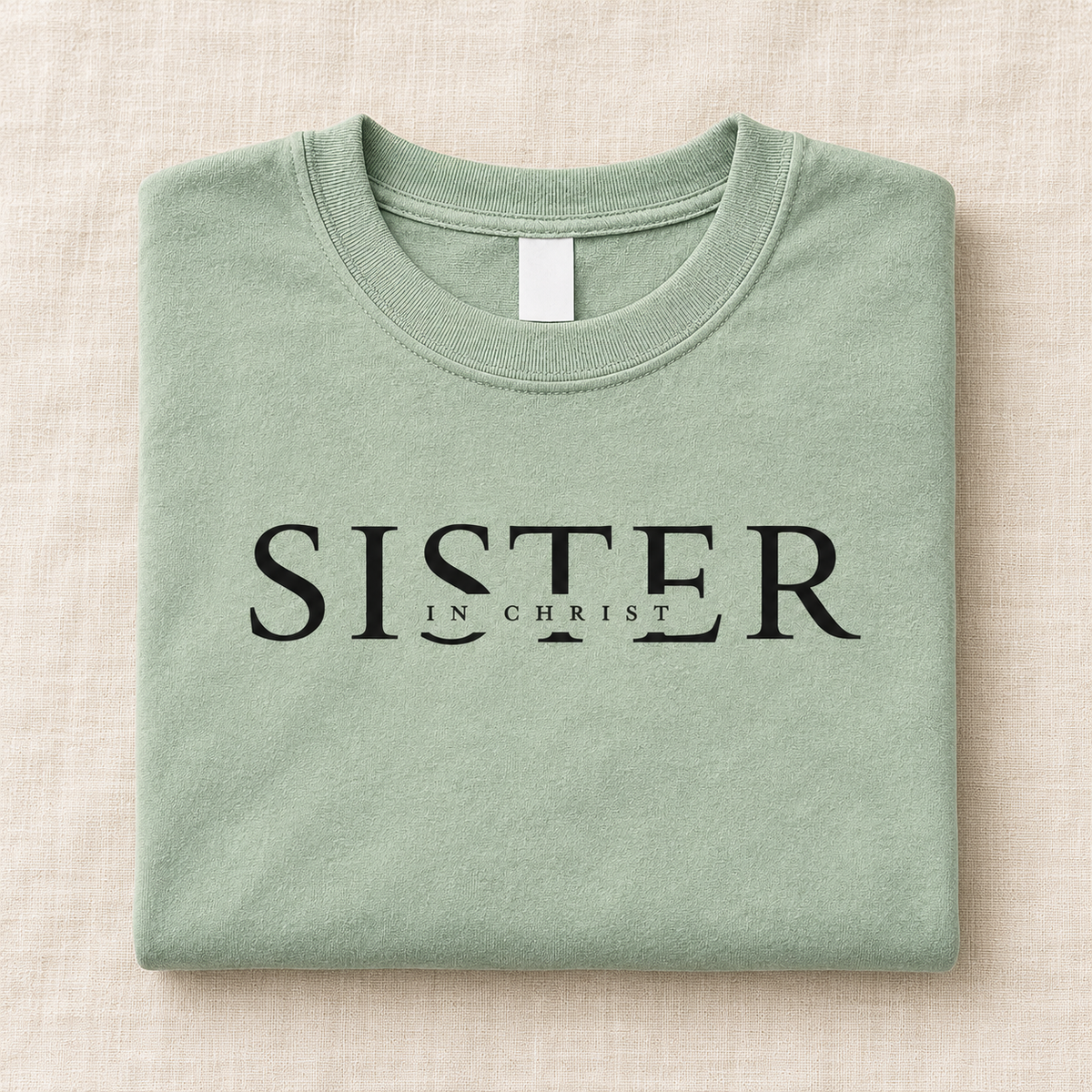 Sisters in Christ tee folded